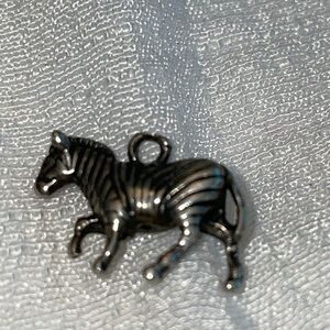 Sterling silver tiny figural striped zebra charm